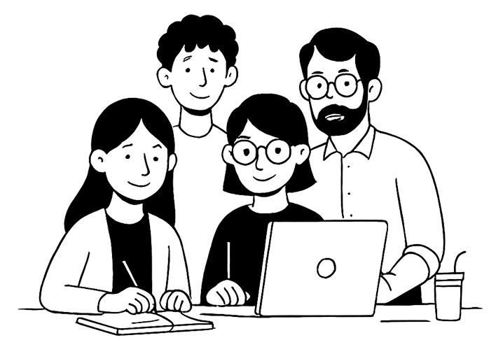 Four therapists reviewing notes together at a laptop